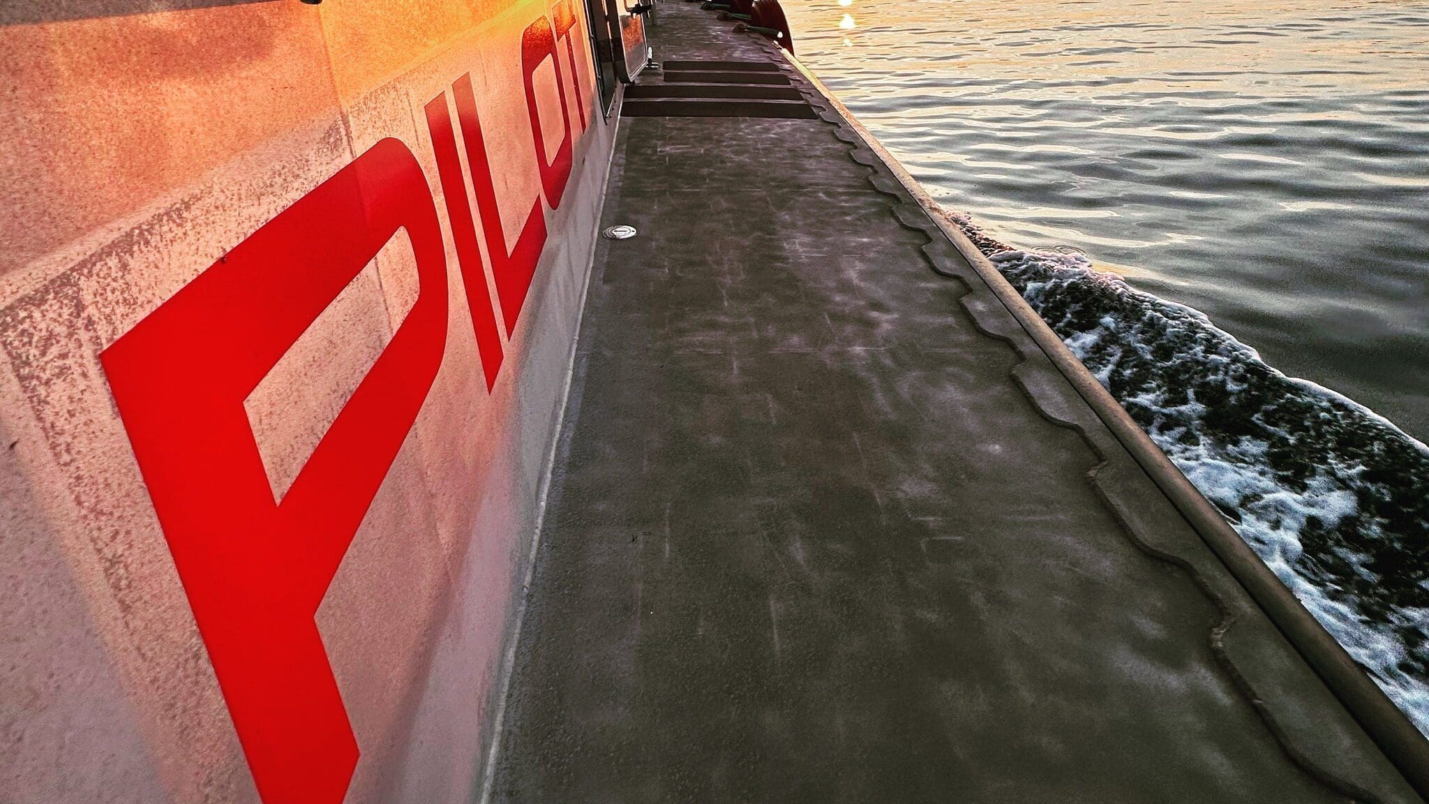 Pilot boat at sunset