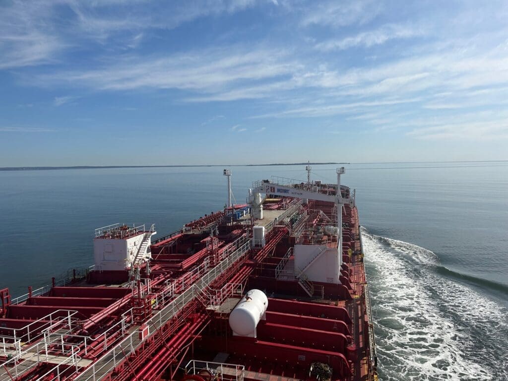 Cargo ship sailing on ocean