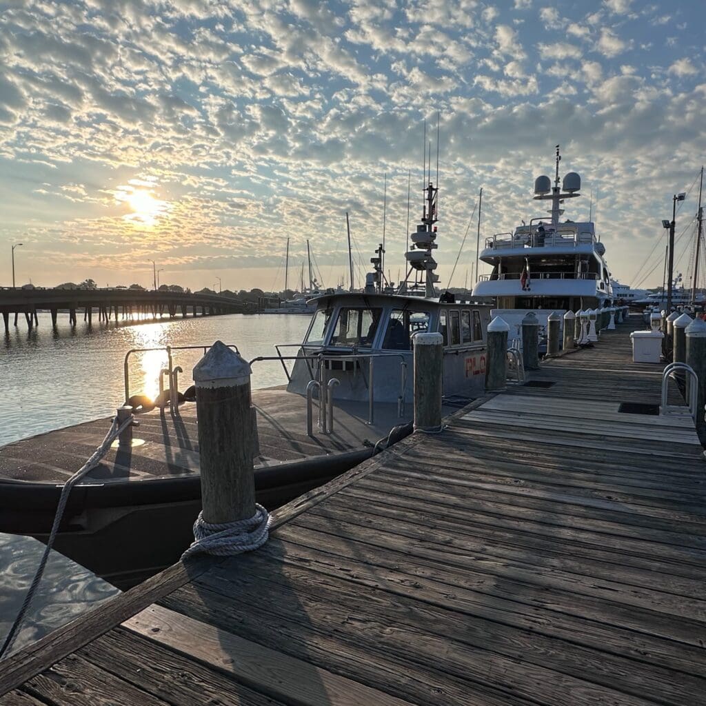 Boats docked at sunrise