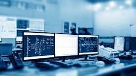 Control room monitors display data